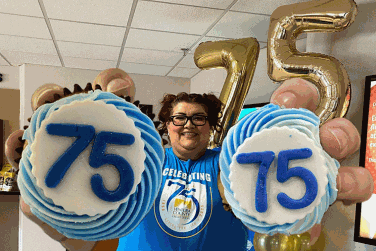 Staff with 75th Anniversary cupcakes